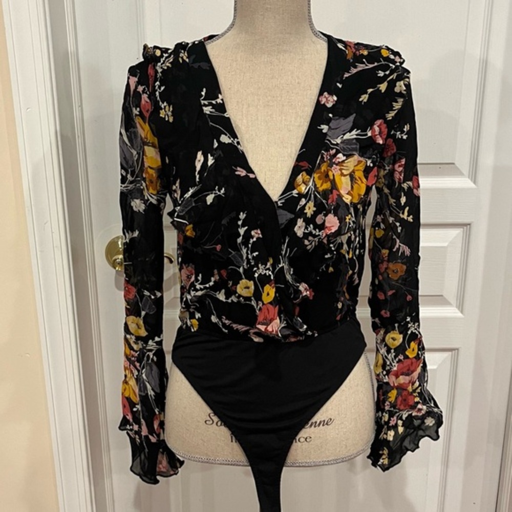 Floral ruffle body suit